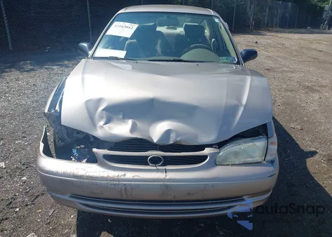 1999 Toyota Corolla Ve z USA, uszkodzony, nr VIN 2T1BR12E7XC141015